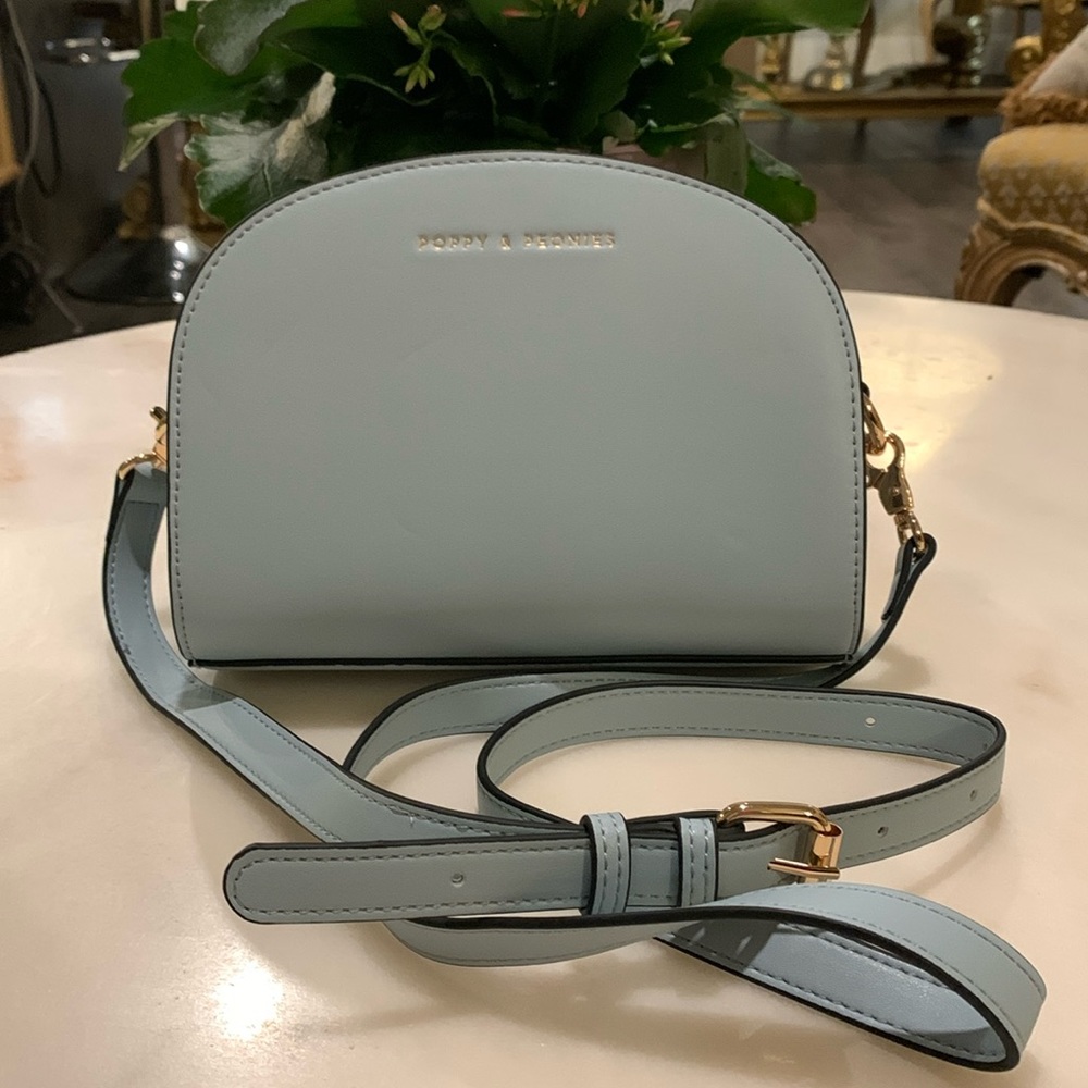 Poppy and Peonies Blue Vegan Leather crossbody bag.